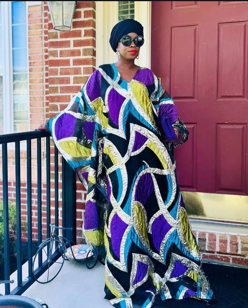 A sweeping purple, teal and gold patchwork grand boubou, made by Minnie